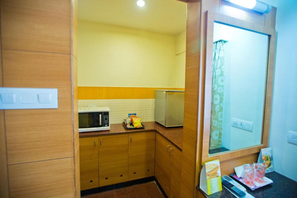 Malles Manotaa Chennai Quarto foto